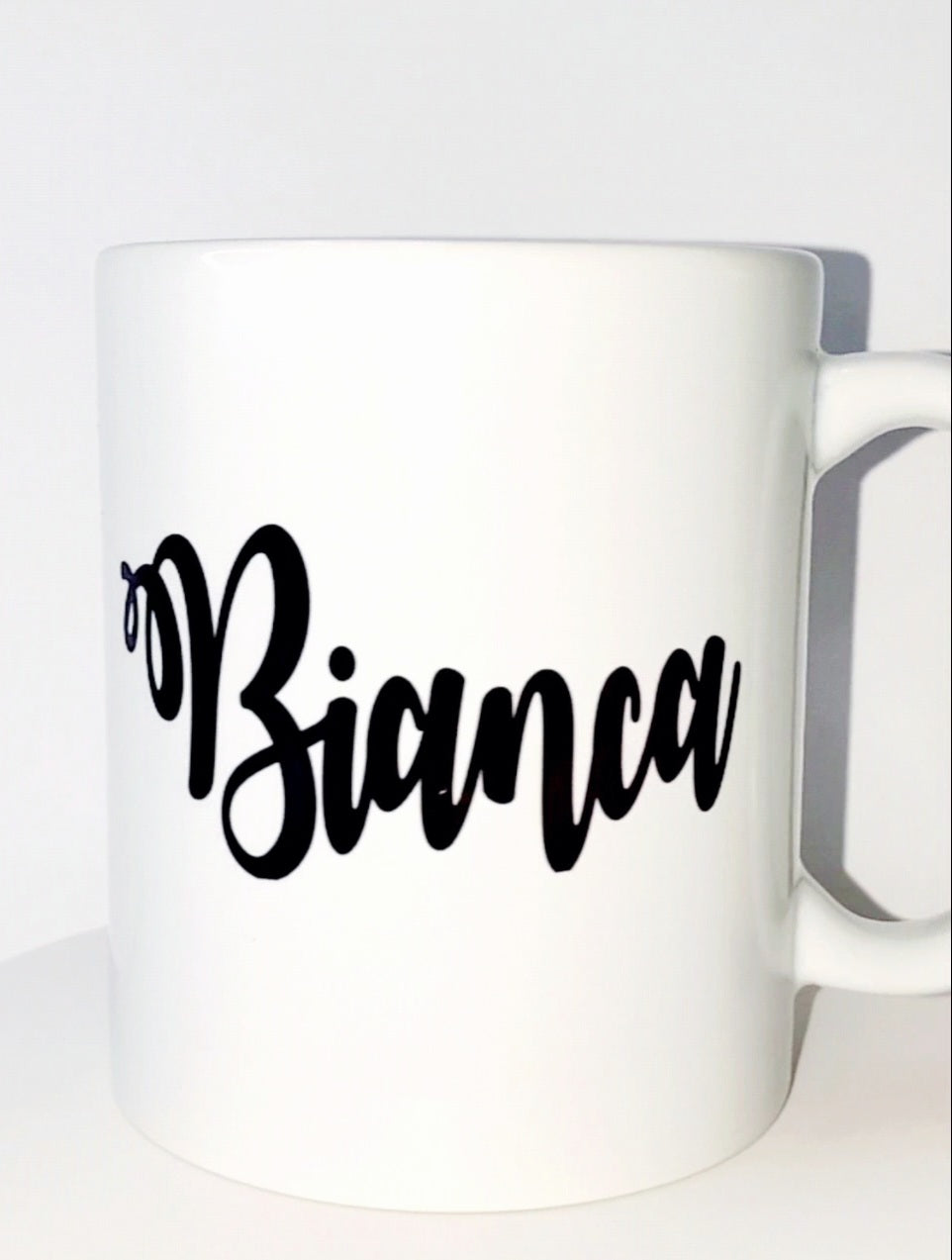 Blinged hair afro sipping mug