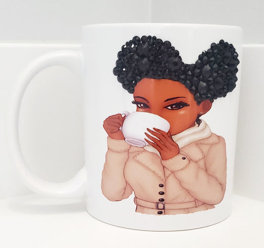 Blinged hair puffs sipping mug